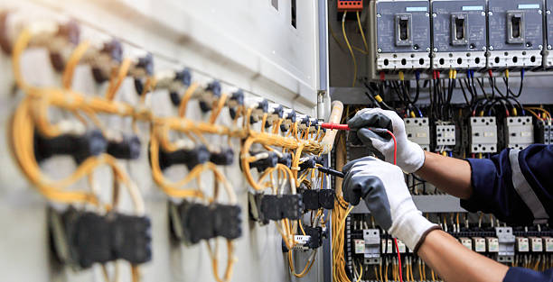 Professional Electrician technician working in East Rockaway, NY